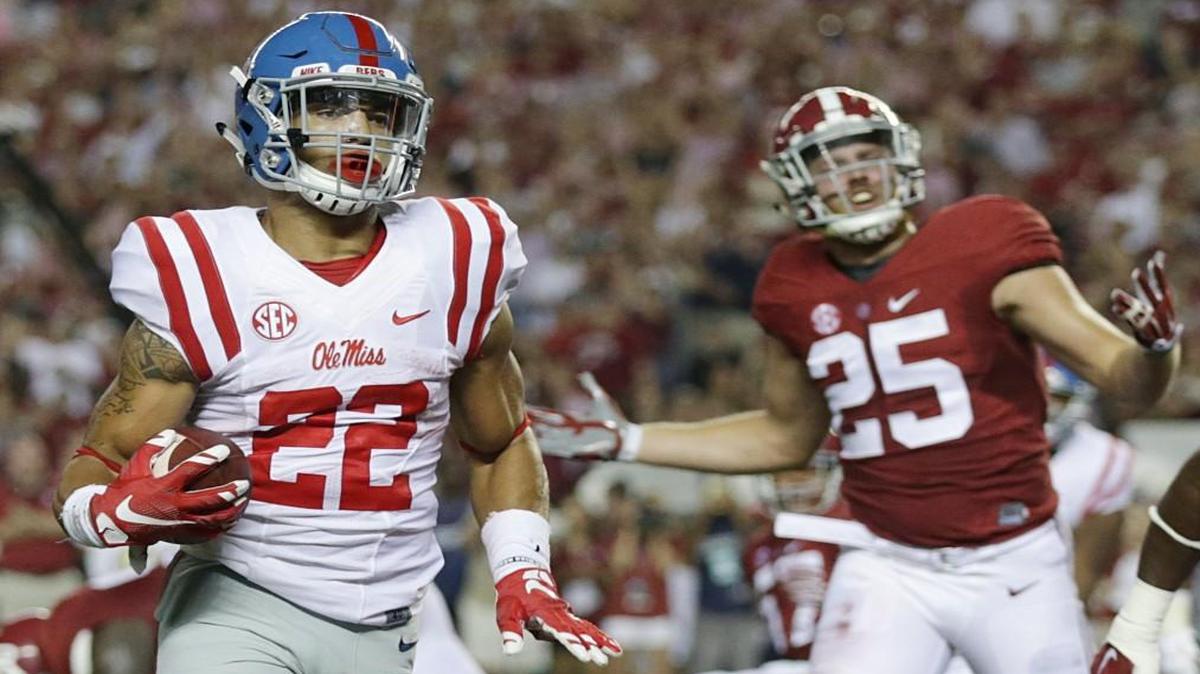 
Mississippi running back Jordan Wilkins scored a touchdown during first half Saturday as Alabama linebacker Dillon Lee watched.
