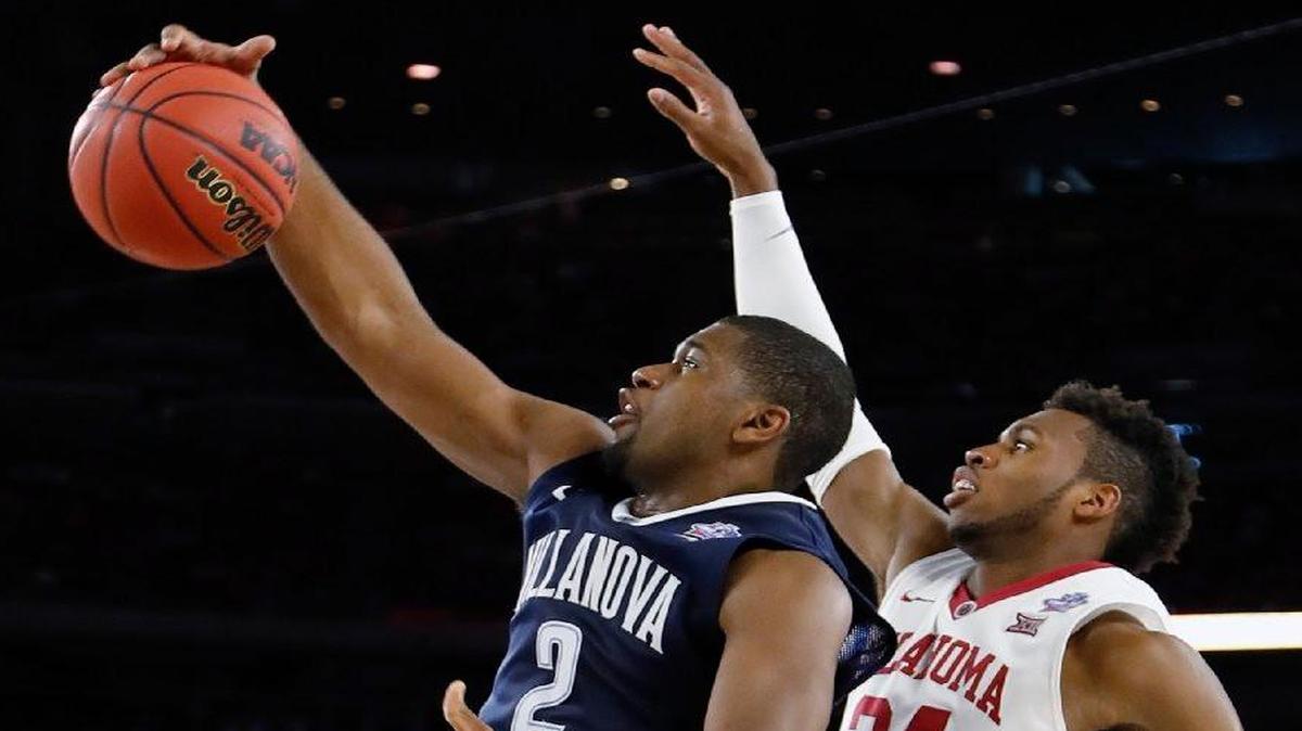 Villanova’s Kris Jenkins (left) has increased his scoring in the NCAA Tournament, averaging 15.8 points per game.
