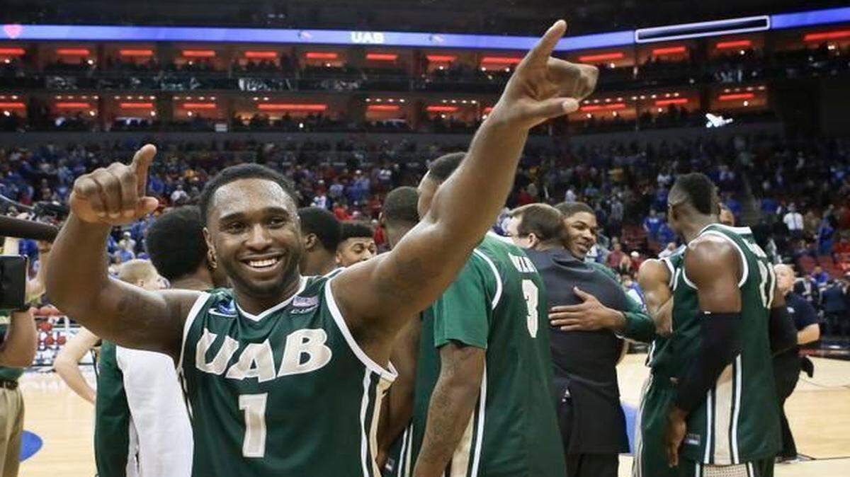 
UAB guard Denzell Watts celebrated after UAB beat Iowa State 60-59 in the round of 64 on Thursday in Louisville, Ky.
