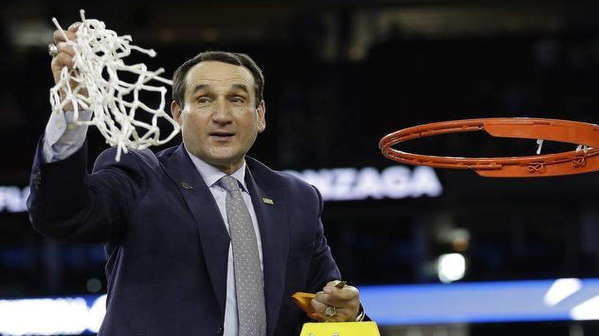 
Duke head coach Mike Krzyzewski cut down the net after a 66-52 win over Gonzaga.
