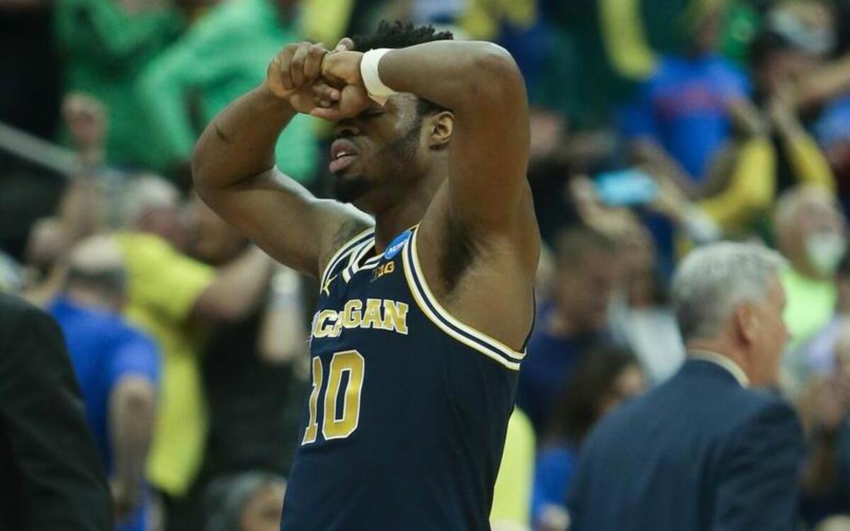 Michigan’s Derrick Walton Jr. reacted after missing the last shot in the final seconds against Oregon in the Sweet Sixteen round of the NCAA Tournament at Sprint Center on Thursday night.