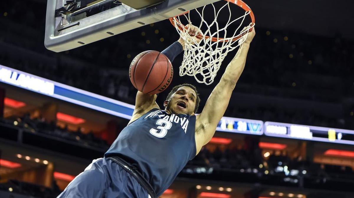 Villanova Wildcats guard Josh Hart (3) dunked the ball in the first half against the Kansas Jayhawks during the Elite Eight round of the NCAA Tournament at the KFC Yum! Center on March 26, 2016 in Louisville, KY.