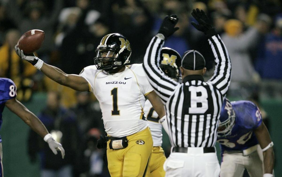 Mizzou’s William Moore picked off one of the two interceptions thrown by KU’s Todd Reesing.