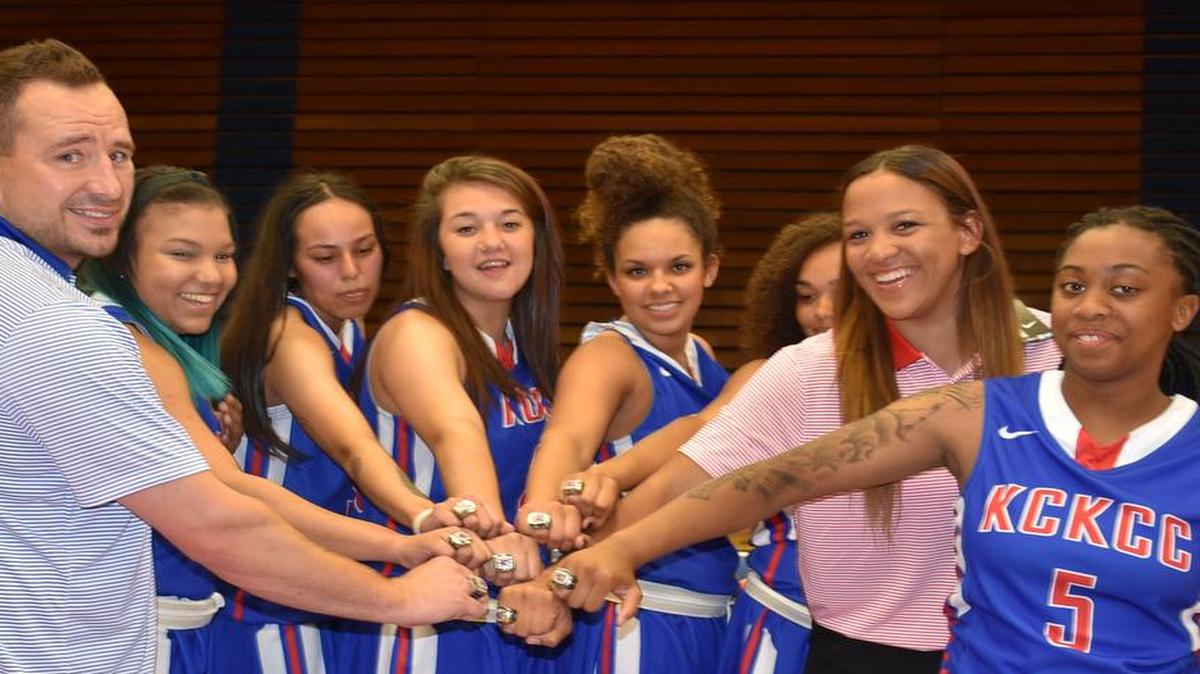 Kansas City Kansas Community College women’s basketball coach Joe McKinstry (from left) and Sierra Roberts, Millie Shade, Brie Tauai, Brooklyn Wagler, Whitney Hazlett, assistant coach Chamissa Anderson and Valencia Scott showed off their championship rings.