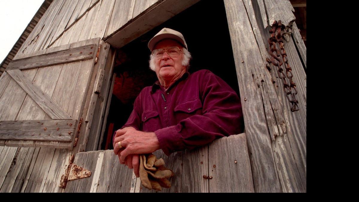 
Walter Byers, former executive director of the NCAA, relaxes on his ranch near Marysville, Kansas, in 1997

