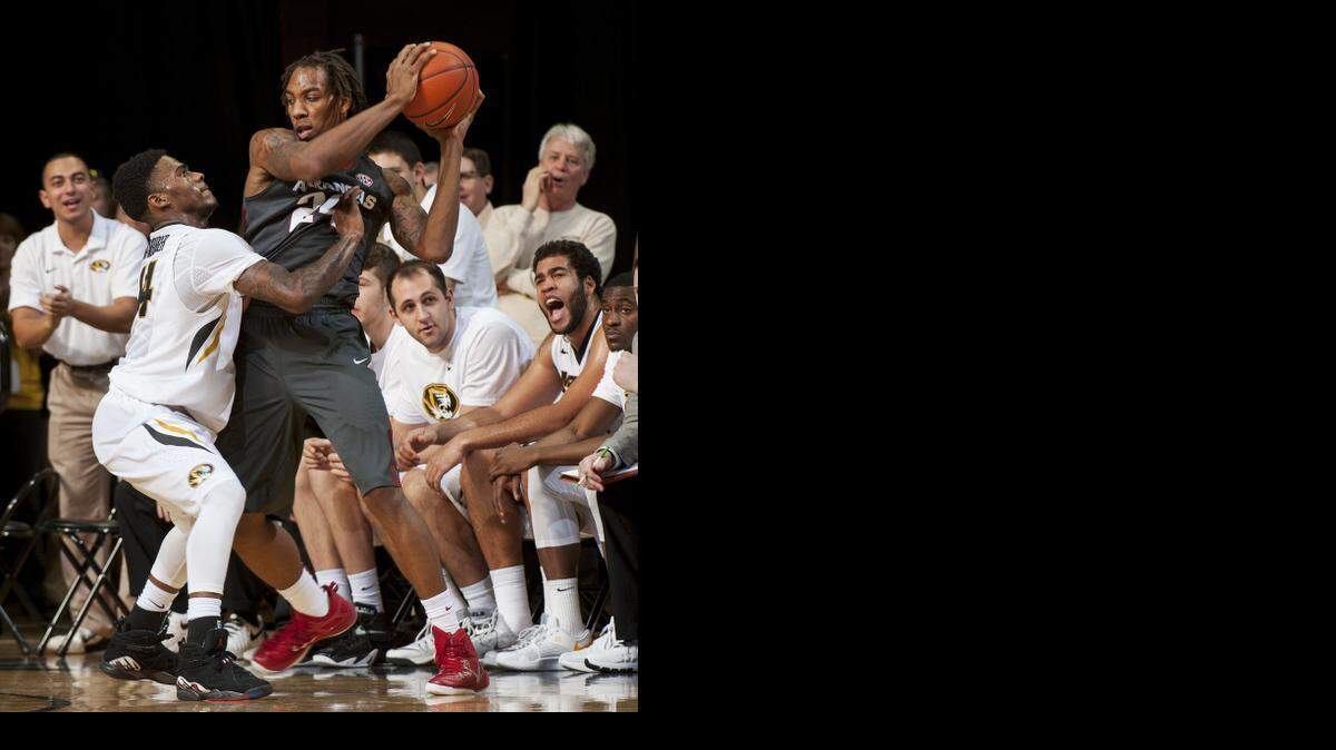 
Arkansas’ Michael Qualls was defended by Missouri’s Keith Shamburger when the teams played in January. The Razorbacks won 61-60.

