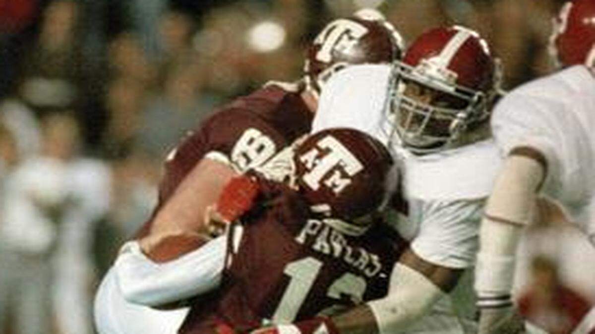 
Alabama’s Derrick Thomas (center) had more sacks than any player in SEC history before his Hall of Fame career with the Chiefs.
