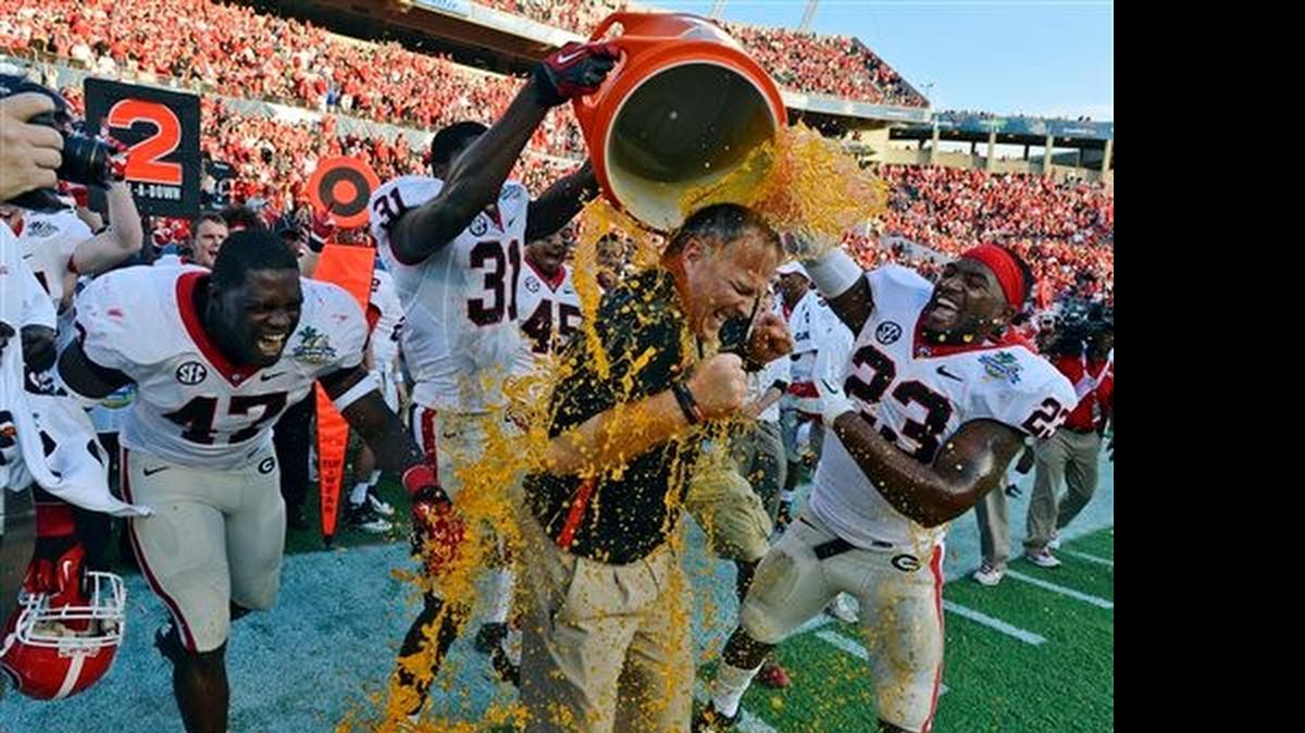 
It’s been two full seasons since Mark Richt has taken a Gatorade bath in celebration of his team, the Georgia Bulldogs, winning the SEC East title. The honor has been Missouri’s the last two years, but Bulldog players and the media voters believe that this time around, the division is Georgia’s to lose. 

