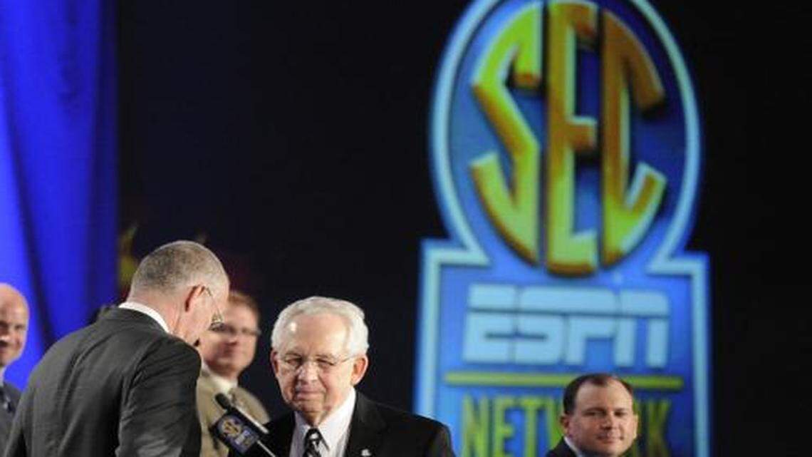 
Southeastern Conference commissioner Mike Slive, second from right, takes the podium after ESPN President John Skipper during a news conference announcing the launching of the SEC Network in partnership with ESPN, Thursday, May 2, 2013, in Atlanta. 
