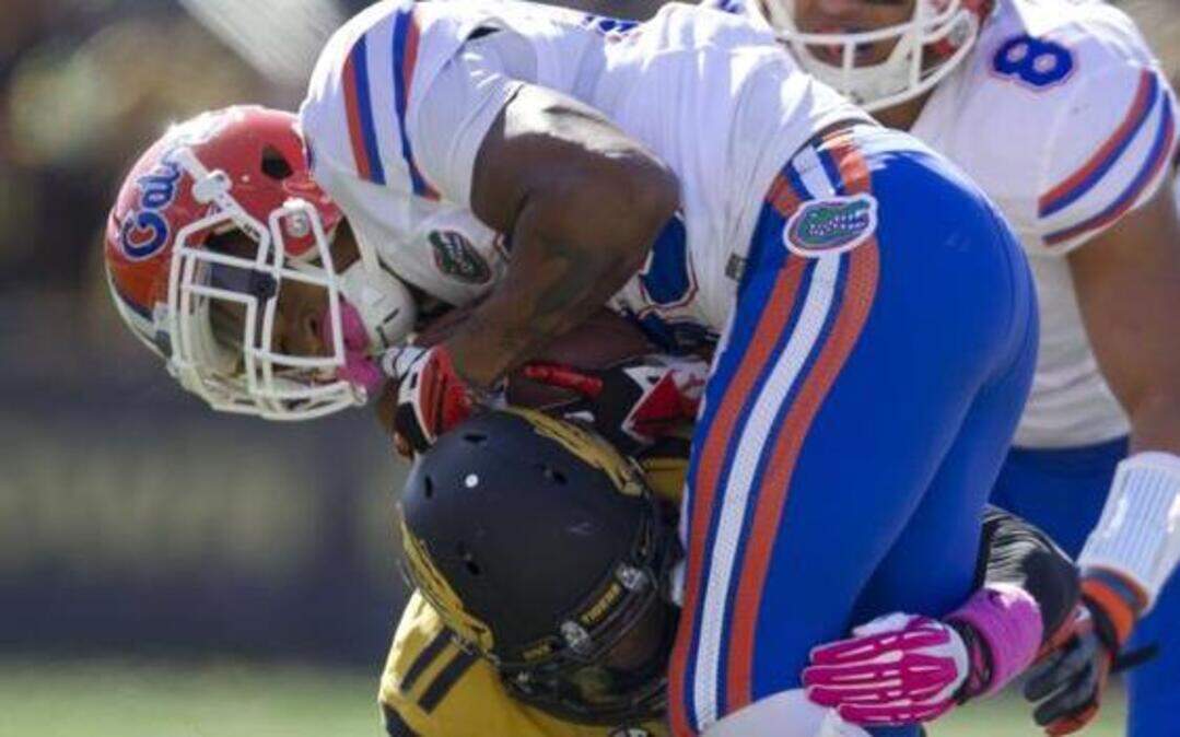 
Missouri defensive back Aarion Penton (11) dropped Florida wide receiver Solomon Patton for no gain in the second half when the Tigers defeated the 36-17 last year in Columbia. The Tigers will try to repeat the feat tonight at “The Swamp” in Gainesville.
