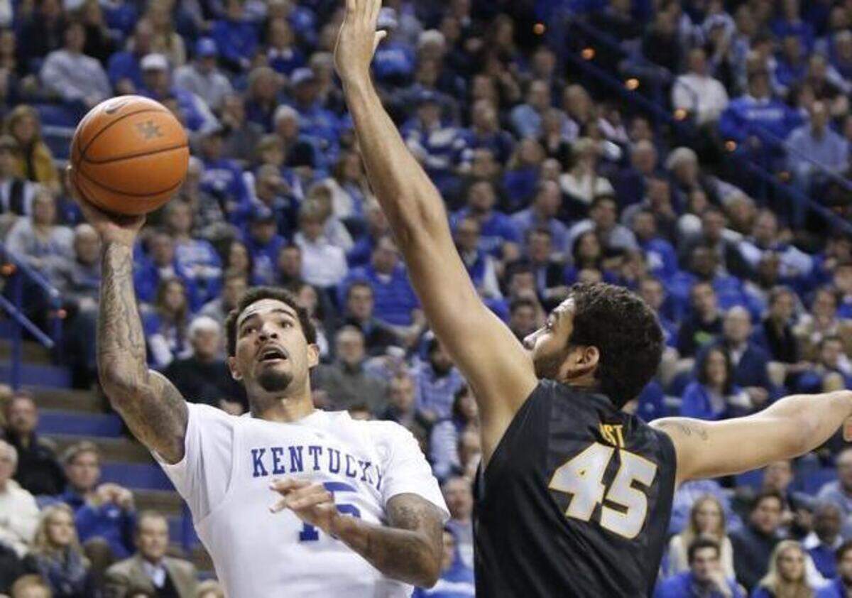 
Kentucky’s Willie Cauley-Stein took a shot as Missouri’s Keanau Post defended during a game on Jan. 13. Kentucky won 86-37.
