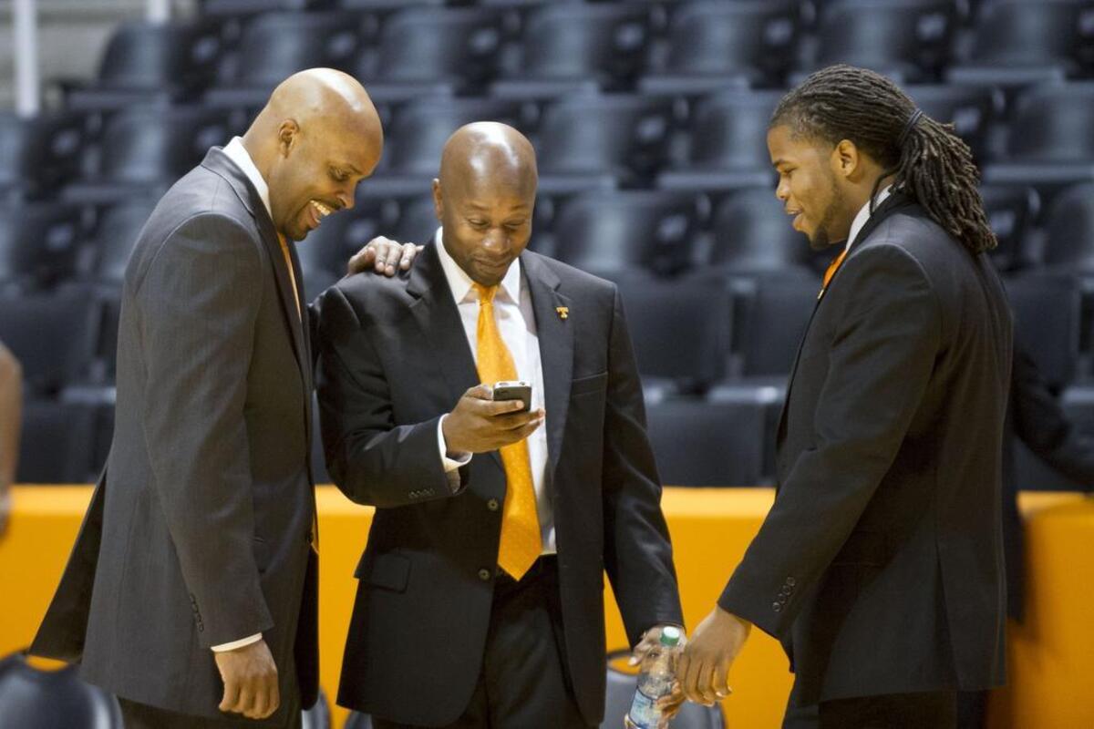 Head coach Cuonzo Martin (left), director of basketball operations Marco Harris (center) and strength coach Nicodemus Christopher during a Tennessee basketball media day in 2013.