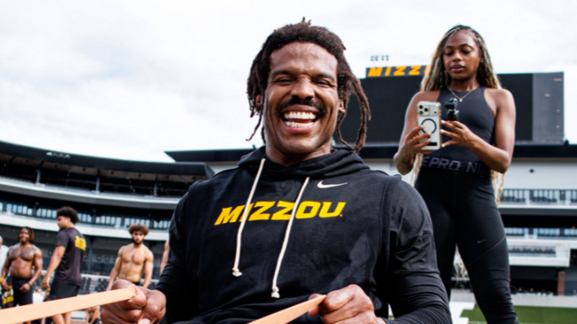 Cam Newton visits Mizzou Tigers’ football practice, walks field in school colors
