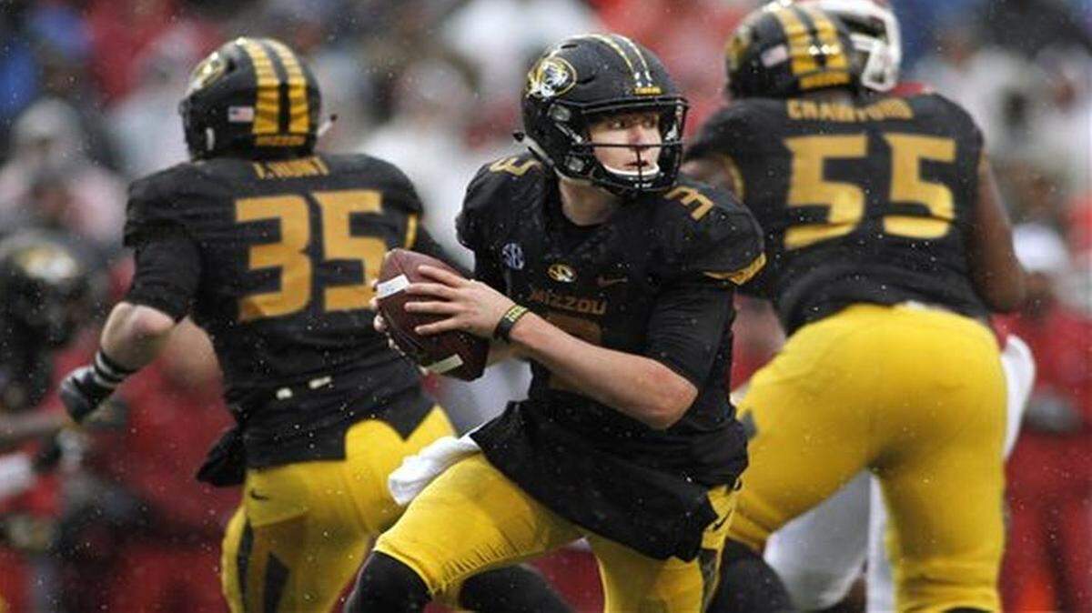 Missouri’s Drew Lock went 9 of 27 for 83 yards with no touchdowns and one interception on a lob to the end zone late in the fourth quarter Friday against Arkansas in a 28-3 loss.