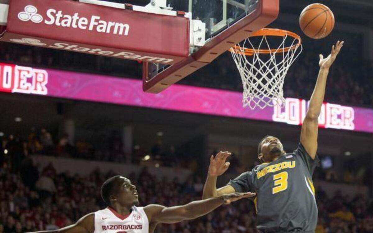 
Missouri forward Jonathan Williams III (right) scored agianst Arkansas forward Alandise Harris during a game last month.
