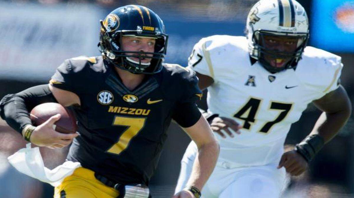 
Missouri quarterback Maty Mauk outruns Central Florida defensive lineman Deion Green (47) during Saturday’s college football game at Faurot Field in Columbia.
