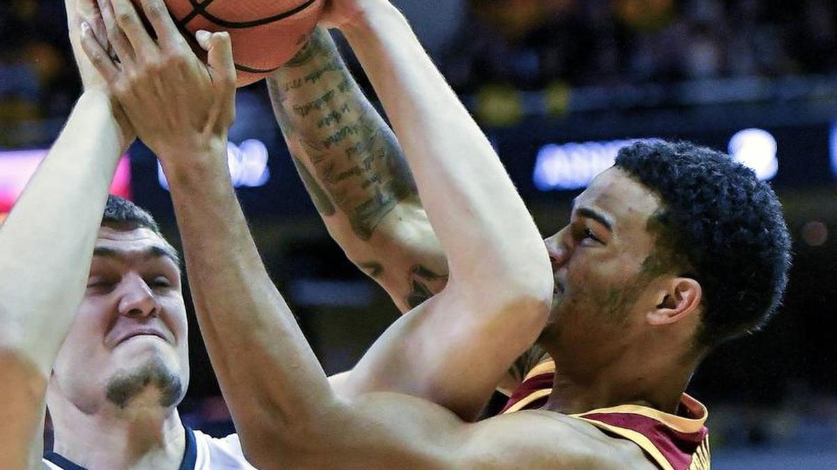 MU sophomore center Reed Nikko (left) is tied for the team lead in rebounds, averaging 5.7 per game.