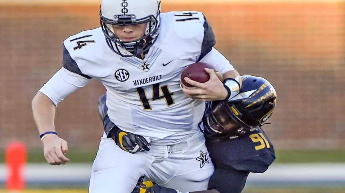 Missouri Tigers defensive end Charles Harris (rear) had 2 1/2 sacks against Vanderbilt and quarterback Kyle Shurmur last Saturday.