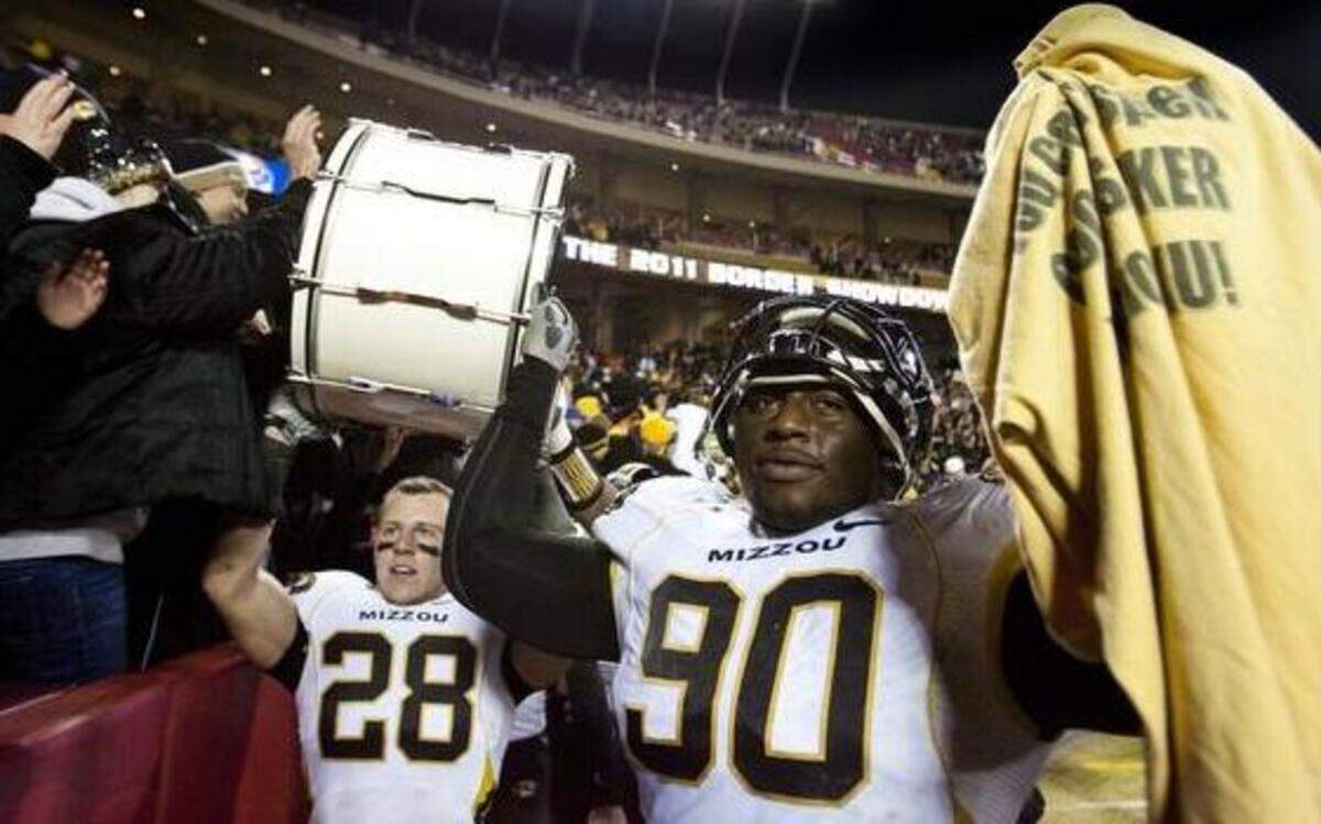 
The last time Missouri played at Arrowhead Stadium, Tigers wide receiver T.J. Moe (left) and defensive lineman Dominique Hamilton carried the trophy drum after Mizzou beat Kansas 24-10.
