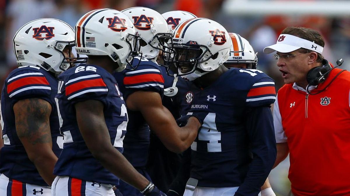 Auburn coach Gus Malzahn talks with his players during last week’s game against Mercer.