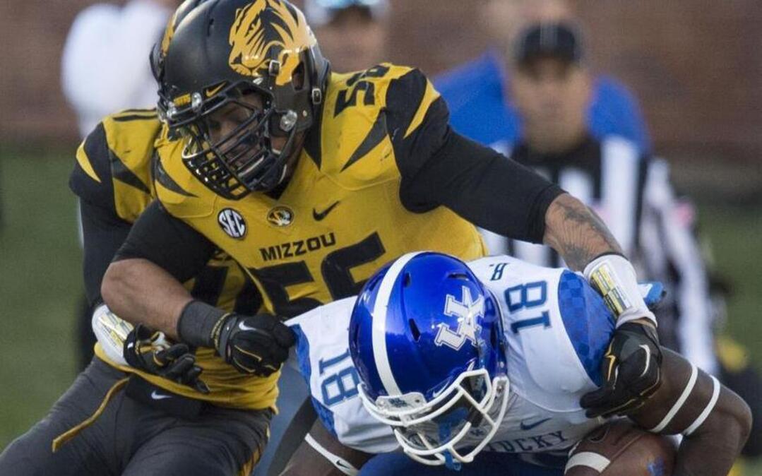 
Shane Ray tackled Kentucky’s Stanley Williams during a MU victory on Nov. 1, 2014, in Columbia.
