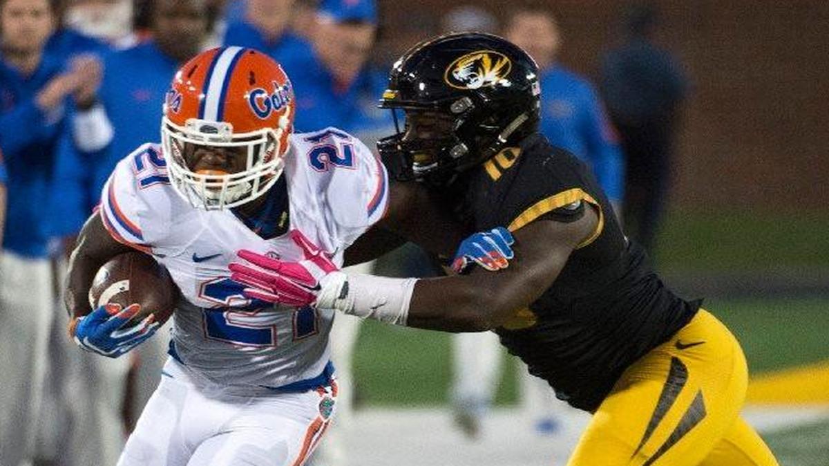 Missouri’s Kentrell Brothers (right) entered the week leading the nation in tackles, but that wasn’t enough to make him a Butkus Award semifinalist.