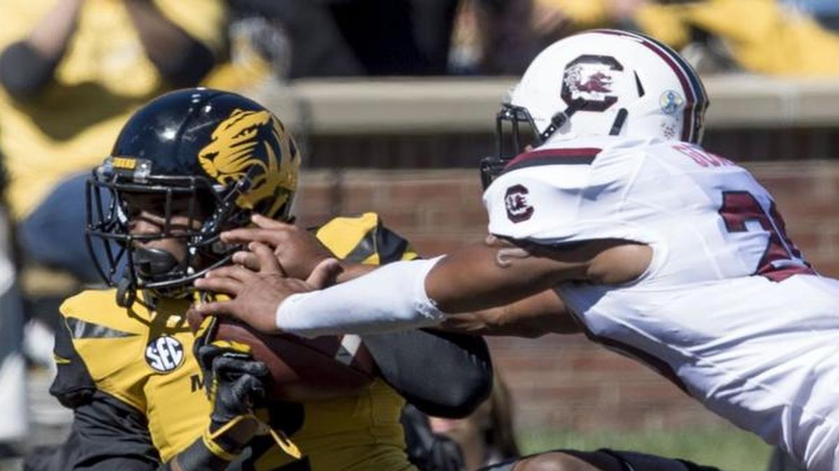 Missouri’s Nate Brown (left) had 27 receptions for 326 yards last season.