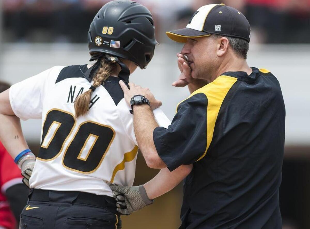 Missouri coach Ehren Earleywine talked with Regan Nash during an NCAA regional softball game against Nebraska on Friday, May 20, 2016, in Columbia, Mo.