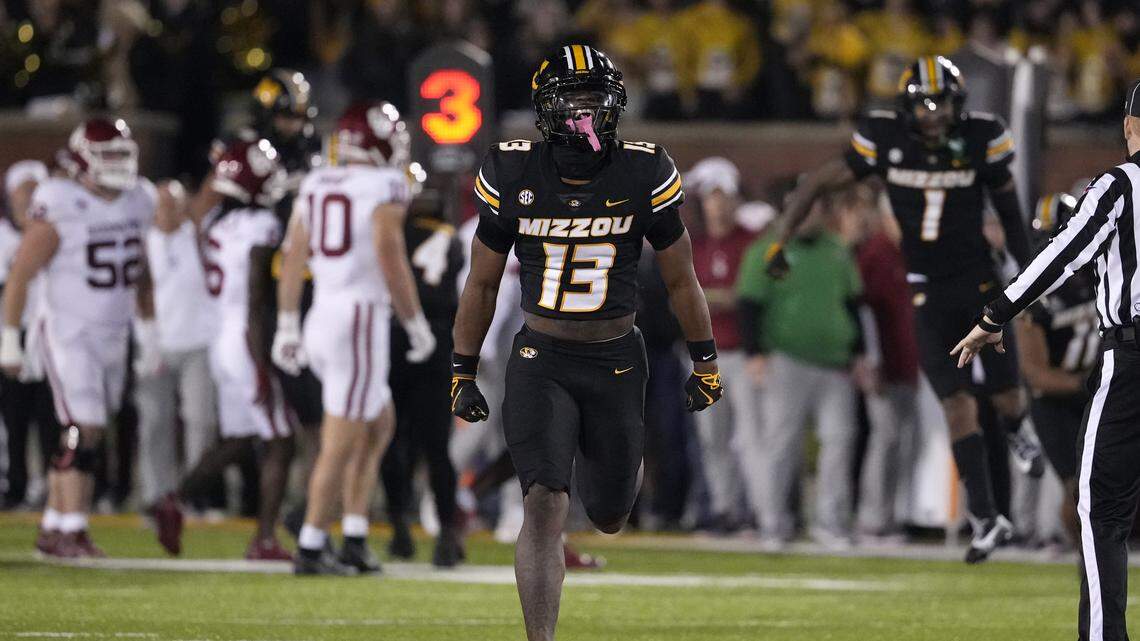 Safety Daylan Carnell #13 of the Missouri Tigers celebrates after a fumble by the Oklahoma Sooners in the second half at Faurot Field/Memorial Stadium on November 9, 2024 in Columbia.