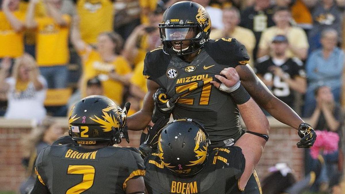 
Younger receivers such as Nate Brown (left), will have to step up for Mizzou following the departure of veterans such as Bud Sasser (top).
