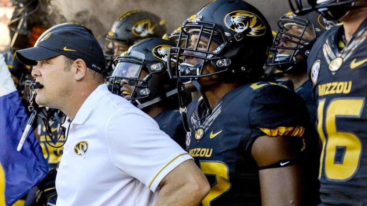 Tigers coach Barry Odom prepared for the start of the game Saturday against Eastern Michigan in Columbia.