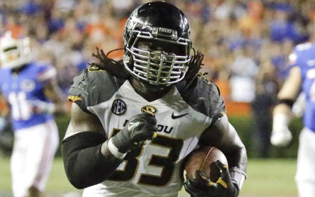 
Missouri defensive lineman Markus Golden ran for a 21-yard touchdown after picking up a Florida fumble on Oct. 18, 2014. Missouri won 42-13.
