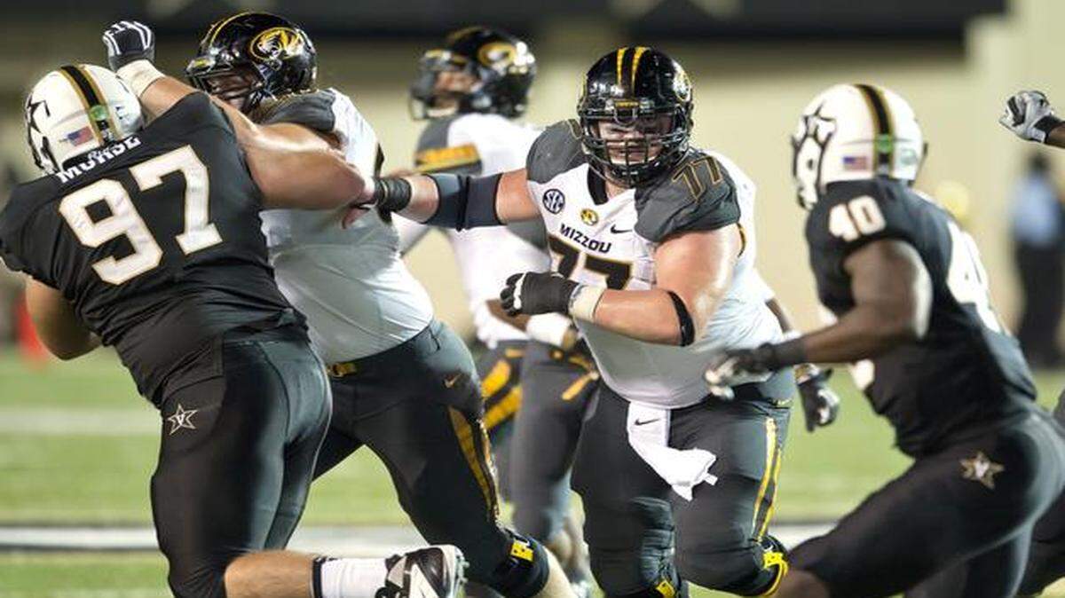 
Missouri’s Evan Boehm (center) is one of 11 SEC centers on the Rimington Trophy’s 2014 fall watch list, which was announced Tuesday.
