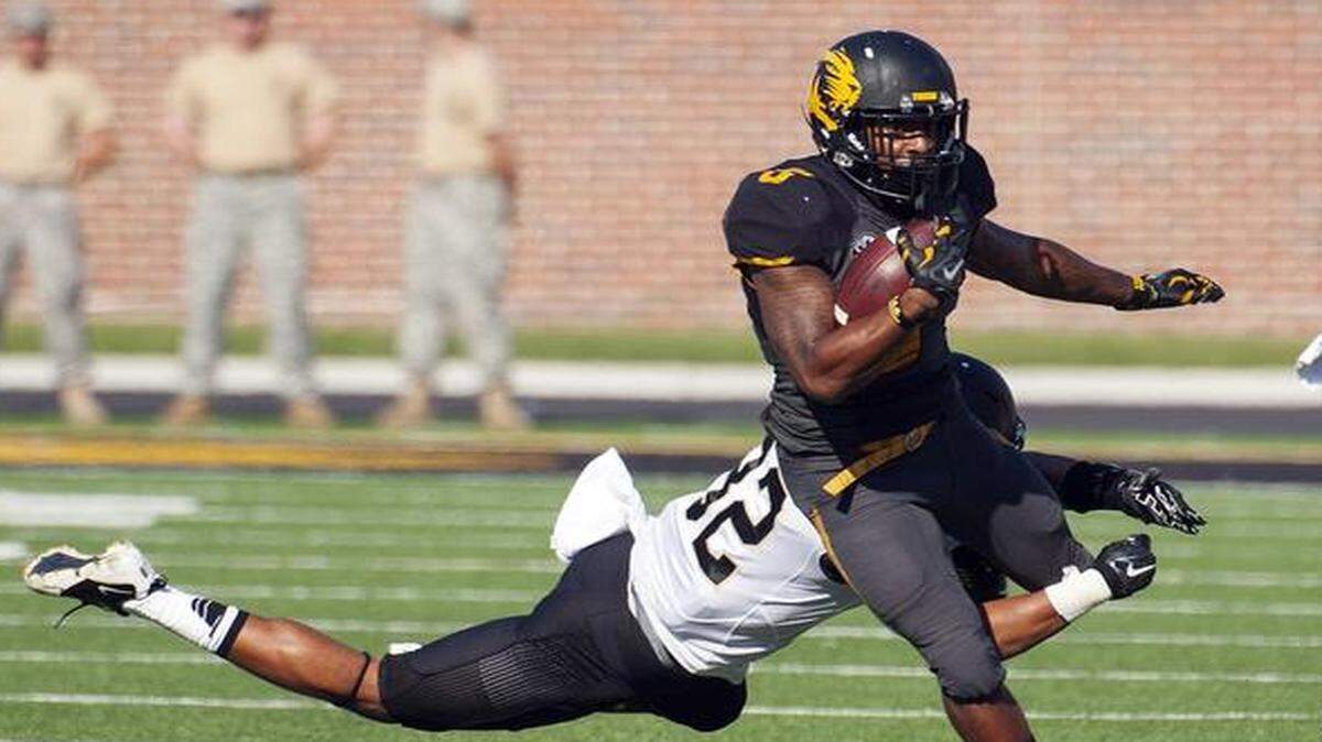 
Missouri running back Marcus Murphy was tackled by Vanderbilt’s Andrew Williamson on Saturday.
