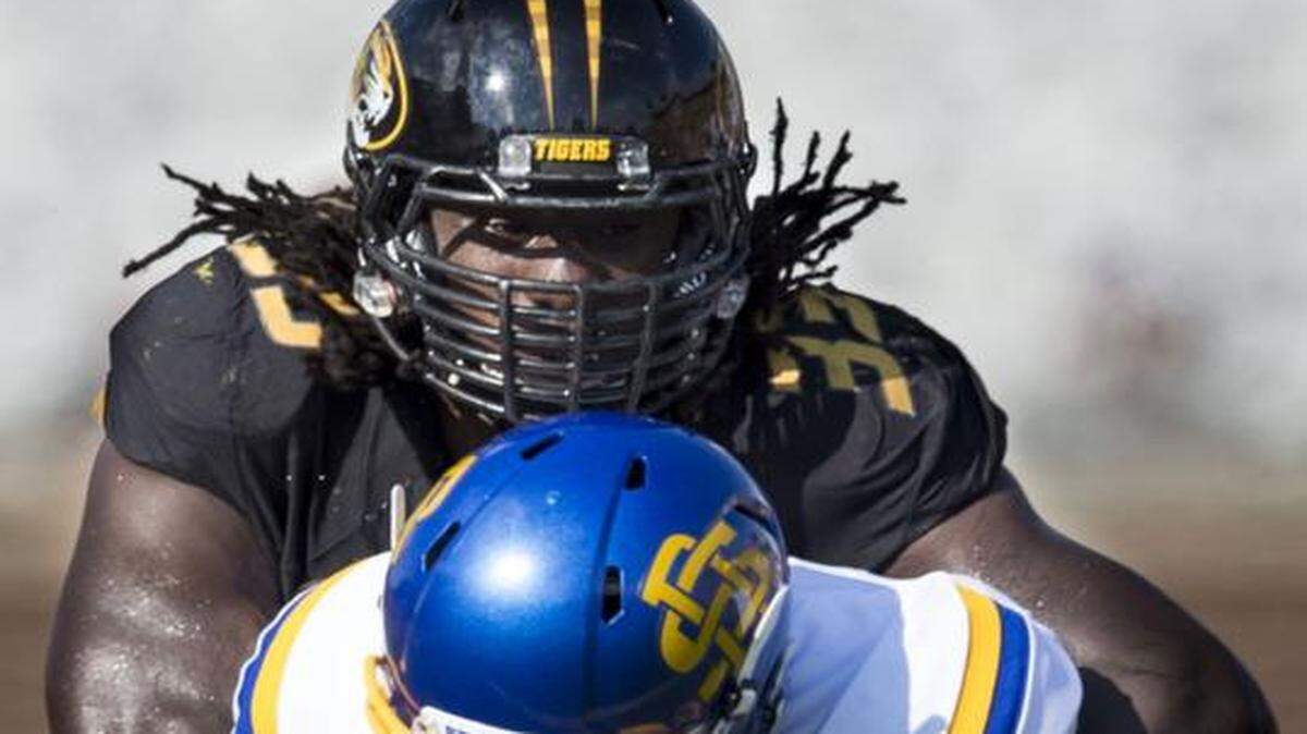 
Missouri Tigers defensive lineman Markus Golden sacked South Dakota State quarterback Jacob Menage in a game last month.

