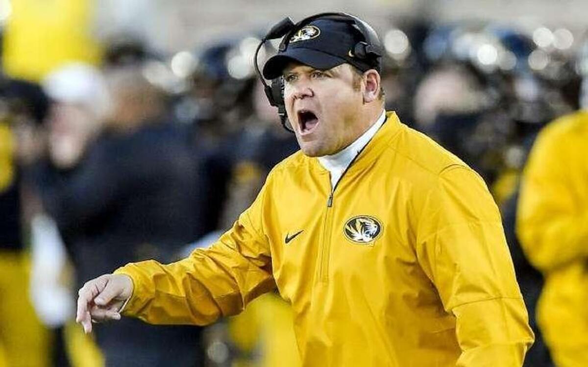 Missouri coach Barry Odom (above) picked up another commitment from a Texas high school player Sunday when Kemp High wide receiver Elijah Gardiner made a verbal commitment to the Tigers.