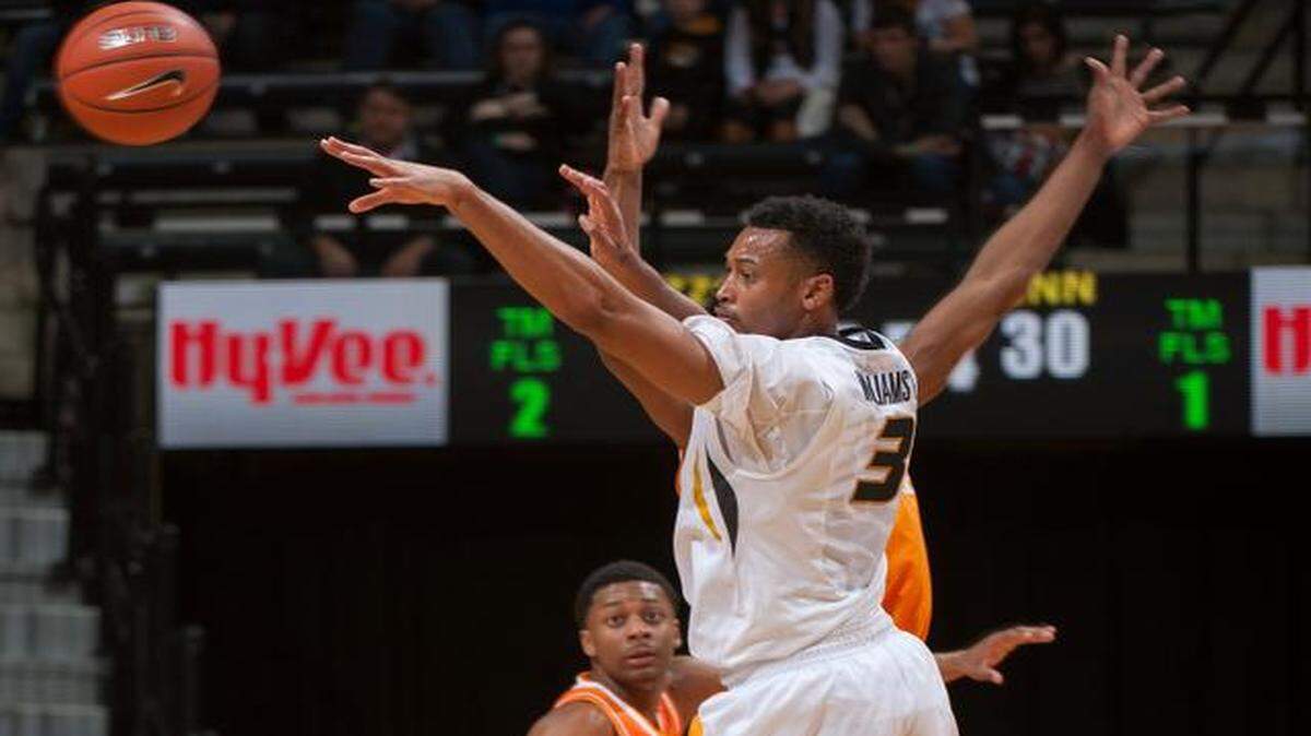 
Missouri’s Johnathan Williams III passed the ball as Tennessee’s Robert Hubbs III watched in the second half of the Tigers’ 59-51 loss to the Volunteers on Saturday night at Mizzou Arena in Columbia. Tonight, the Tigers take on the Aggies of Texas A&M in College Station, Texas.
