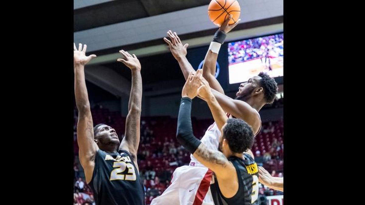 Mizzou’s Jeremiah Tilmon (left) scored 12 points in 14 minutes Wednesday night at Alabama