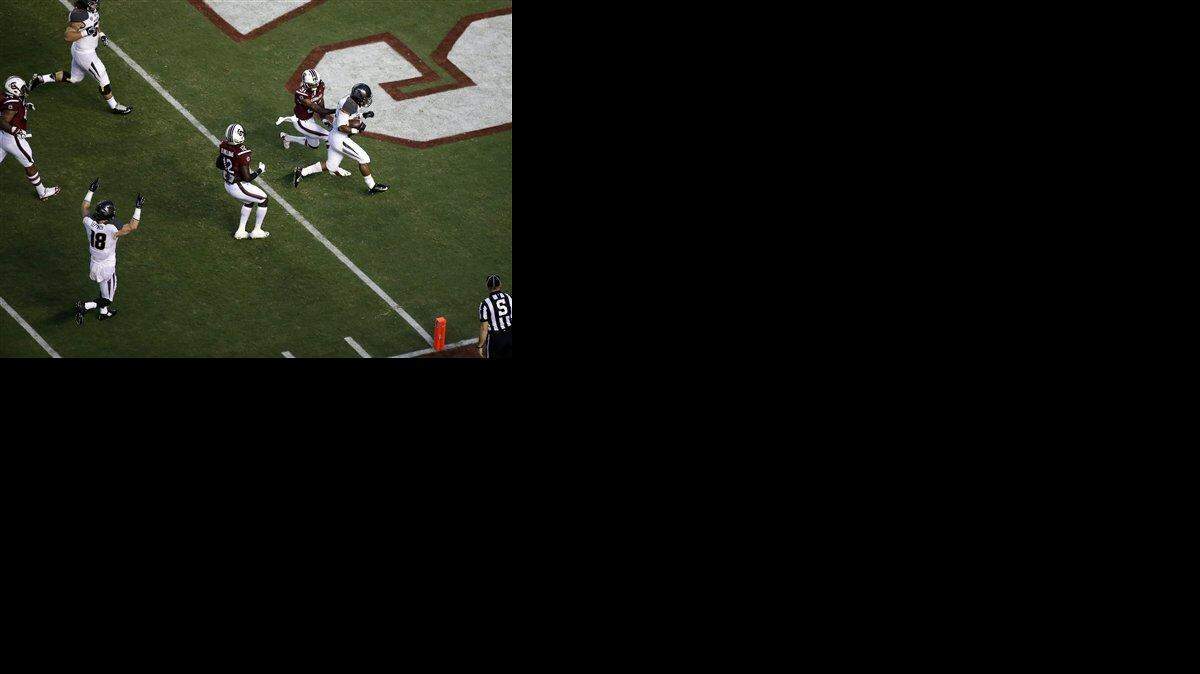 
Missouri running back Russell Hansbrough (32) scores a touch down during the first half of an NCAA football game against South Carolina on, Saturday, Sept. 27, 2014, in Columbia, S.C.
