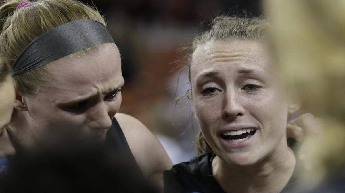 Missouri guard Morgan Stock (center) joined teammates at mid court after their loss to Texas 73-55 in Monday’s second-round NCAA Tournament women’s college basketball game in Austin.