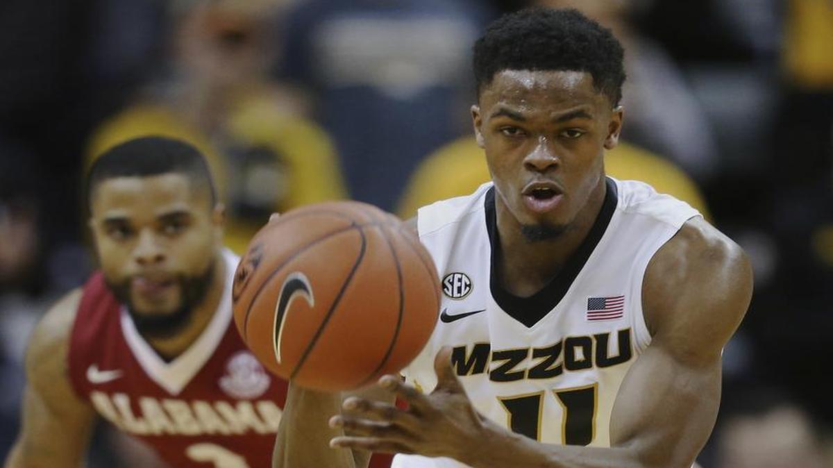Guard K.J. Walton (right) will be transferring from Missouri along with guard Frankie Hughes, the school confirmed Tuesday.