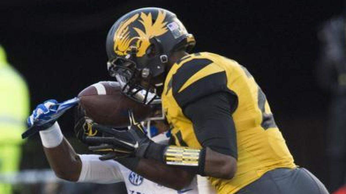 
Missouri Tigers safety Ian Simon (21) in action during a November 2014 game against Kentucky at Faurot Field in Columbia. Simon this year is a senior, and he and his fellow seniors describe their goals for 2015. “This senior group had greatness handed down to us. This team has the responsibility on its shoulder now to keep that tradition going,” Simon said.

