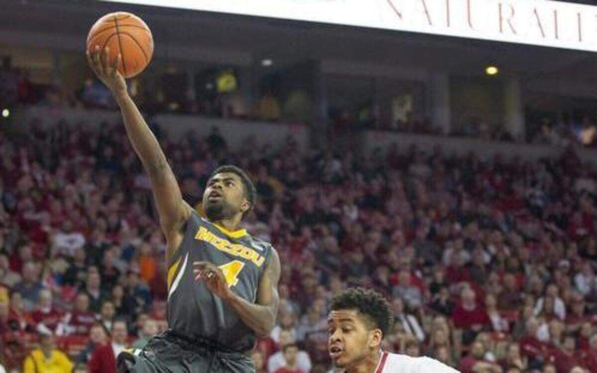 
Missouri guard Tramaine Isabell scored aganist Arkansas guard Anton Beard during Wednesday’s game.
