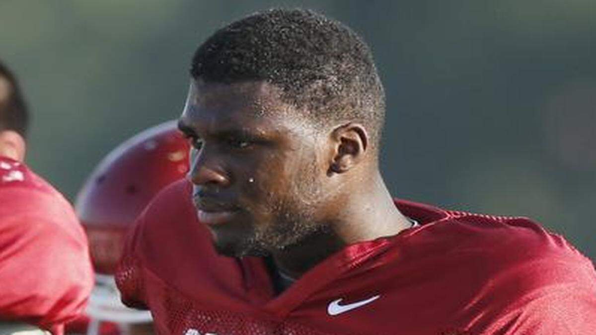 
Oklahoma's Dorial Green-Beckham takes a water break during an Aug. 5 football practice in Norman.
