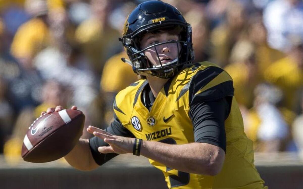 
Missouri quarterback Drew Lock still wears a No. 12 Lee’s Summit basketball backpack to interviews and only arrived on campus in June, but is feeling comfortable as the Tigers’ starter in that role.

