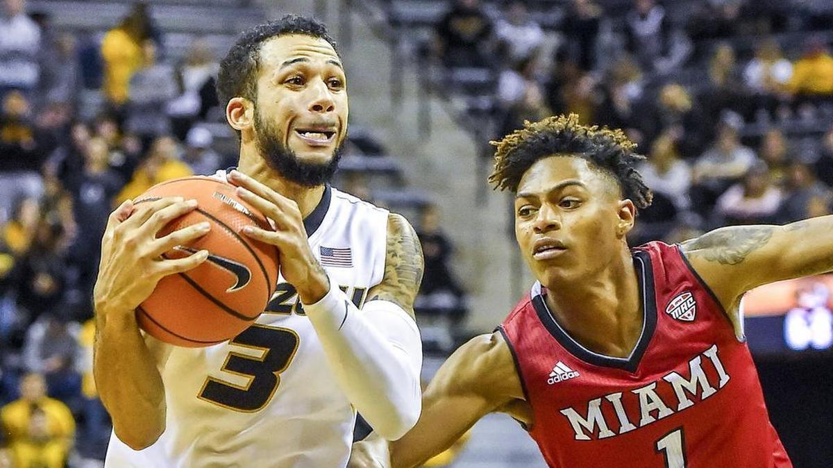 Guard Kassius Robertson (left) leads Missouri in scoring with 15.1 points per game.