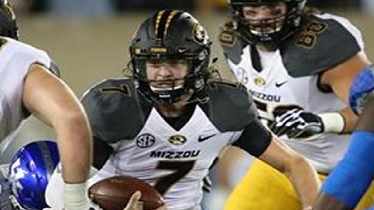 
Missouri quarterback Maty Mauk looked for an opening against Kentucky in Saturday’s game.
