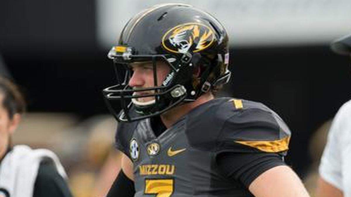 
Missouri quarterback Maty Mauk and head coach Gary Pinkel watch as the Tigers warm up before their game against Indiana Saturday at Faurot Field in Columbia.
