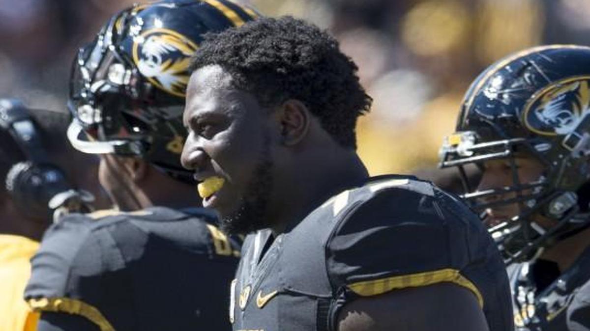 
Missouri defensive lineman Terry Beckner Jr. (79) left the sidelines after a timeout during Saturday’s game against Connecticut at Faurot Field.

