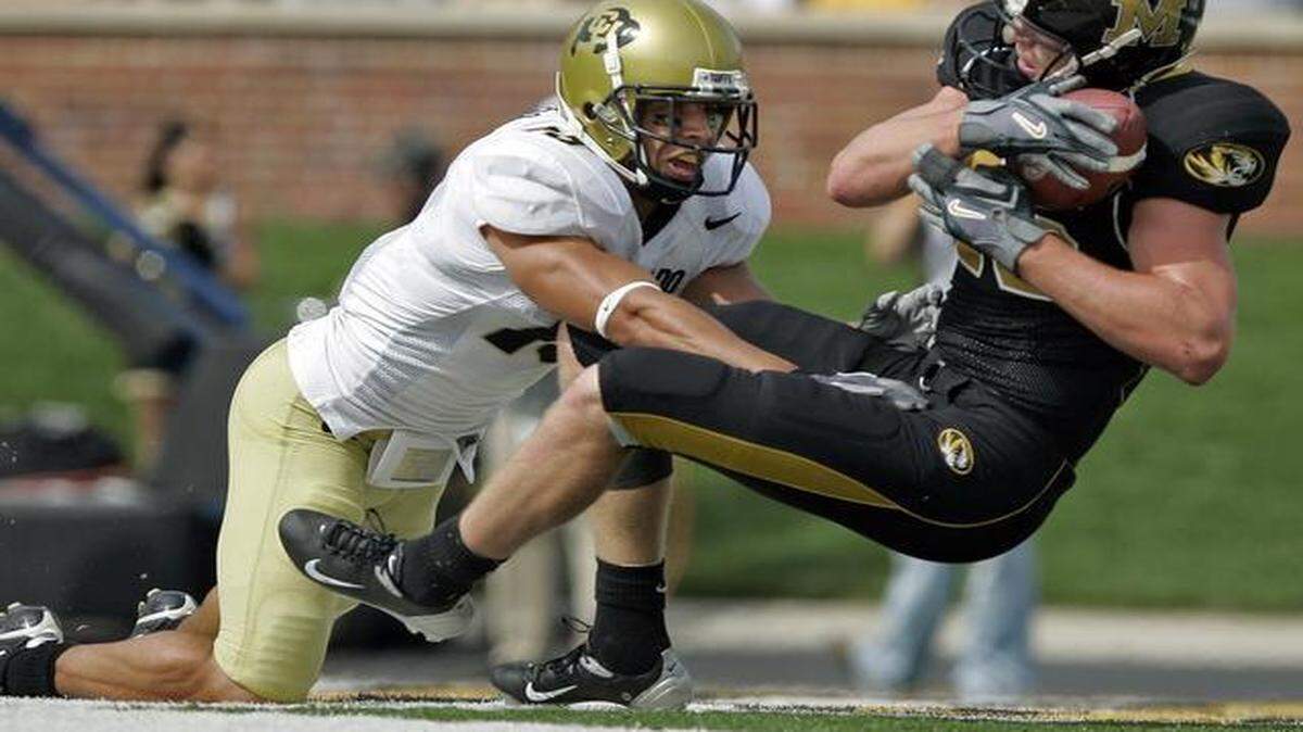 
In a game in 2006, Missouri tight end Chase Coffman caught a touchdown pass against Ryan Walters of Colorado. Walters was hired as an assistant coach at Mizzou.

